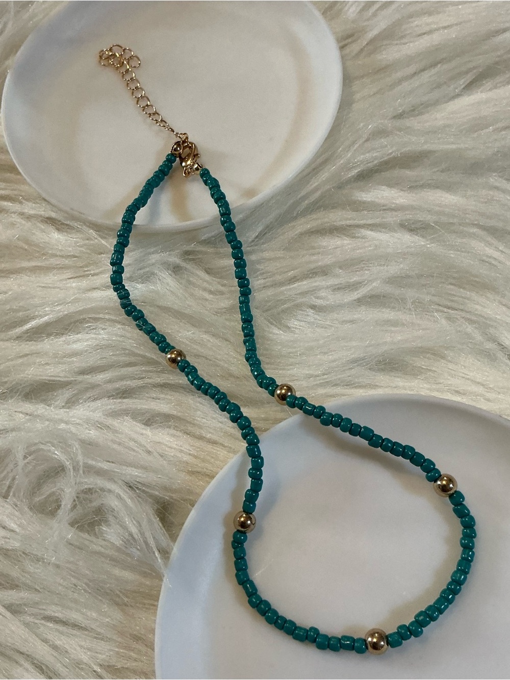 Simple blue and gold-tone bead high collar necklace